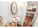 Small powder room with pedestal sink and decorative mirror at 3155 Boldmere Se Trl # 3, Smyrna, GA 30080