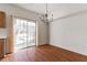 Bright dining area with hardwood floors and sliding glass doors at 520 Dragonfly Ct, Cumming, GA 30040