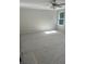 Bright bedroom with ceiling fan and natural light streaming through the windows at 1356 Lucan Ln # Wc226, Lawrenceville, GA 30043