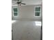 Spacious bedroom with natural light streaming through two windows at 1356 Lucan Ln # Wc226, Lawrenceville, GA 30043