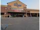 Exterior of brick building with a covered entrance and spacious parking area at 1356 Lucan Ln # Wc226, Lawrenceville, GA 30043