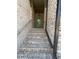 Front entry stairs with brick and teal door at 1356 Lucan Ln # Wc226, Lawrenceville, GA 30043