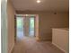 Upstairs hallway features carpet floors and several doors at 1356 Lucan Ln # Wc226, Lawrenceville, GA 30043