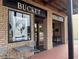 Commercial building with brick exterior and vintage signs at 344 Riverwood Pass, Dallas, GA 30157