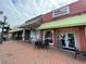 Commercial building featuring storefronts, outdoor seating, and awnings at 344 Riverwood Pass, Dallas, GA 30157