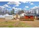 Large backyard with various sheds and homes at 3734 N Camp Creek Sw Pkwy, Atlanta, GA 30331