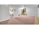 Finished basement area with carpet and access to other rooms at 3734 N Camp Creek Sw Pkwy, Atlanta, GA 30331