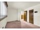 Cozy bedroom with window coverings and carpet at 3734 N Camp Creek Sw Pkwy, Atlanta, GA 30331