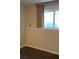 Simple bedroom with neutral walls and carpet at 3734 N Camp Creek Sw Pkwy, Atlanta, GA 30331