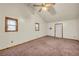 Large living room with vaulted ceiling and carpet at 3734 N Camp Creek Sw Pkwy, Atlanta, GA 30331