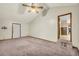 Living room with vaulted ceiling, carpet, and access to kitchen at 3734 N Camp Creek Sw Pkwy, Atlanta, GA 30331