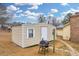 Tan metal storage shed with grill at 3734 N Camp Creek Sw Pkwy, Atlanta, GA 30331