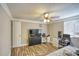 Bedroom with hardwood floors and ceiling fan at 6414 Wedgewood Trce, Tucker, GA 30084