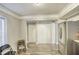 Hallway with white doors and wood-look flooring at 6414 Wedgewood Trce, Tucker, GA 30084