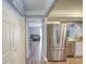 Stainless steel refrigerator in kitchen with wood-look flooring at 6414 Wedgewood Trce, Tucker, GA 30084