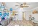 Bright living room with hardwood floors and ceiling fan at 6414 Wedgewood Trce, Tucker, GA 30084