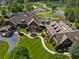 Luxury clubhouse with extensive landscaping and a large parking area at 4844 Elkhorn Hill Dr, Suwanee, GA 30024