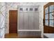 Stylish built-in coat closet with marble top at 4844 Elkhorn Hill Dr, Suwanee, GA 30024