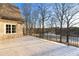 Brick patio with iron railings overlooking a lake at 4844 Elkhorn Hill Dr, Suwanee, GA 30024