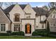 Elegant home entrance featuring a grand arched entryway at 4844 Elkhorn Hill Dr, Suwanee, GA 30024