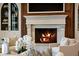 Elegant fireplace with built-in shelving at 4844 Elkhorn Hill Dr, Suwanee, GA 30024