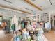 Well-lit retail space offering an array of clothing and accessories at 4844 Elkhorn Hill Dr, Suwanee, GA 30024