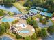 Aerial view of community pool, water park, and multiple tennis courts at 4844 Elkhorn Hill Dr, Suwanee, GA 30024