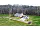 Aerial view showing house, driveway, and landscaping at 5288 East Cherokee Dr, Canton, GA 30115