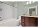 Bathroom with tiled shower/tub combo and vanity at 5288 East Cherokee Dr, Canton, GA 30115