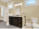 Bathroom with dark vanity, neutral walls, and grab bar at 5288 East Cherokee Dr, Canton, GA 30115