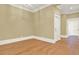 Bright and airy bedroom with hardwood floors and neutral walls at 5288 East Cherokee Dr, Canton, GA 30115