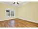 Spacious bedroom with hardwood floors and large window at 5288 East Cherokee Dr, Canton, GA 30115