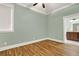 Light and airy bedroom with hardwood floors and ceiling fan at 5288 East Cherokee Dr, Canton, GA 30115