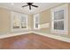 Bright bonus room with hardwood floors and plantation shutters at 5288 East Cherokee Dr, Canton, GA 30115