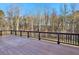 Large deck overlooking a private wooded area at 5288 East Cherokee Dr, Canton, GA 30115