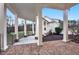 Covered brick patio with white columns and wooded views at 5288 East Cherokee Dr, Canton, GA 30115