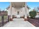 Covered exterior patio with brick flooring and white siding at 5288 East Cherokee Dr, Canton, GA 30115