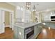 Spacious kitchen with island, stainless steel appliances, and ample cabinetry at 5288 East Cherokee Dr, Canton, GA 30115