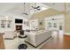 Large living room featuring hardwood floors, a fireplace, and built-in shelving at 5288 East Cherokee Dr, Canton, GA 30115