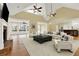 Living room featuring hardwood floors, a fireplace, and built-in shelving at 5288 East Cherokee Dr, Canton, GA 30115