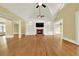 Spacious living area with hardwood floors and a fireplace at 5288 East Cherokee Dr, Canton, GA 30115