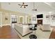 Living room boasting hardwood floors and a fireplace at 5288 East Cherokee Dr, Canton, GA 30115