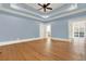 Spacious main bedroom with hardwood floors and access to a private balcony at 5288 East Cherokee Dr, Canton, GA 30115