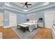 Luxurious main bedroom with hardwood floors and plenty of natural light at 5288 East Cherokee Dr, Canton, GA 30115