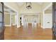 Bright two-story foyer with hardwood floors and a chandelier at 5288 East Cherokee Dr, Canton, GA 30115