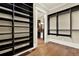 Large walk-in closet with ample shelving and hanging space at 5288 East Cherokee Dr, Canton, GA 30115