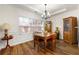 Elegant dining room with hardwood floors and built-in hutch at 1503 Dolcetto Nw Trce # 2, Kennesaw, GA 30152