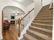 Staircase with hardwood handrail leading to upper level at 1503 Dolcetto Nw Trce # 2, Kennesaw, GA 30152