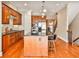 Kitchen with island, hardwood floors, and stainless steel appliances at 25 High Gate Trl, Decatur, GA 30030