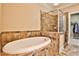 Spa-like bathroom with soaking tub and walk-in shower at 25 High Gate Trl, Decatur, GA 30030